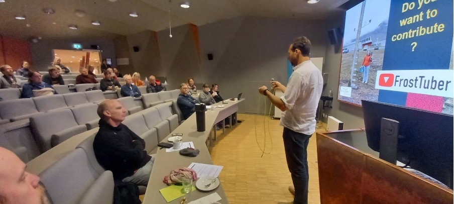 Ullrich Neumann showing the frost tube at the public permafrost seminar at Svalbard Museum/Unis. Photo: Hanne H. Christiansen. Picture 3